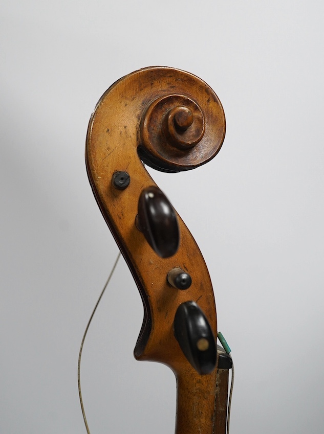 Two late 19th or early 20th century violins, one with case, back of largest measures 36cm. Condition - poor to fair